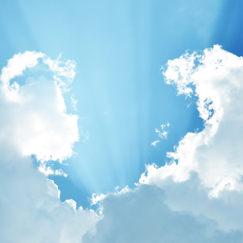 Sun Rays and Billowing Clouds