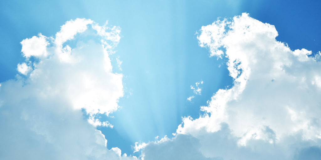 Sun Rays and Billowing Clouds